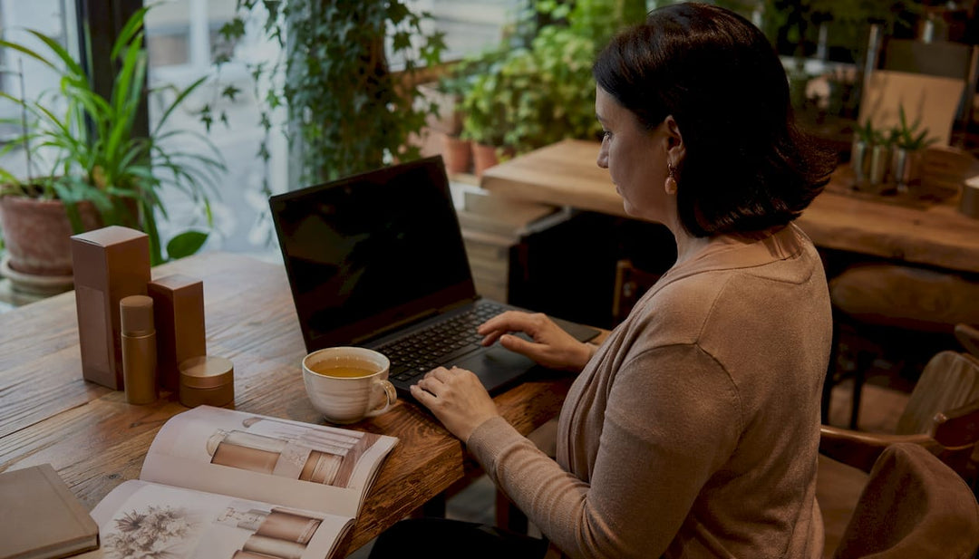 Woman browsing Polish skincare online in UK home
